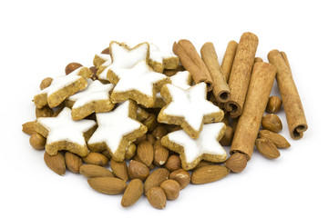 typical christmas cinnamon star cookies, nuts and cinnamon stick