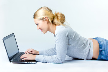 beautiful woman browsing internet at home 