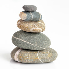 Fototapeta na wymiar Pile of stones isolated on white background
