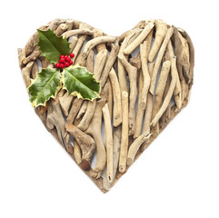 Hand-made ornamental heart made of dry sticks