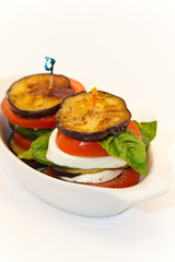 Eggplant with mozzarella, tomatoes and basil