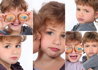 Little girl covering eyes with eggs © auremar