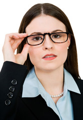 Gorgeous businesswoman adjusting eyeglasses