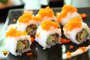 maki sushi avocado and eel © Oran Tantapakul