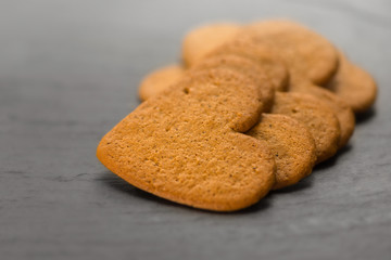 Ginger bread hearts on granite stone