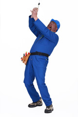Fototapeta premium clumsy laborer getting electrocuted