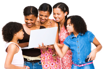 Smiling friends using a laptop