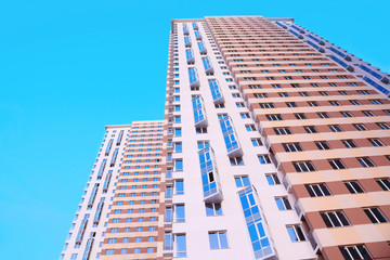 High, multistory building, clear blue sky