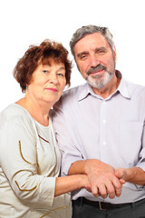 smiling senior couple hold for hands, hug, isolated