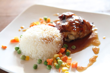 Grilled Chicken teriyaki rice on wood background