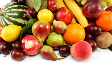 Set of different fresh fruits on a white background.