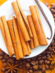 cinnamon and coffee on the white plate