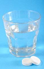 white pills and water