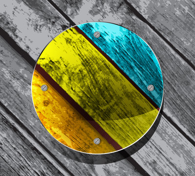 colorful circular plate on the wooden planks background