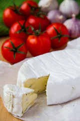 Brie cheese with cherry tomatoes
