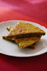 Vegetarian chickpeas cake with herbs