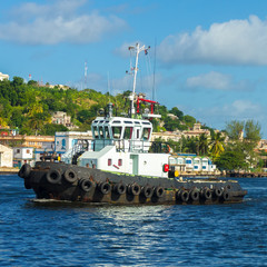 Tugboat sailing in the bay of Havana