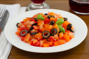 salad tomato, pepper, olives and basil