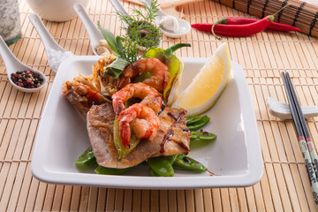 shrimps with fish and vegetables