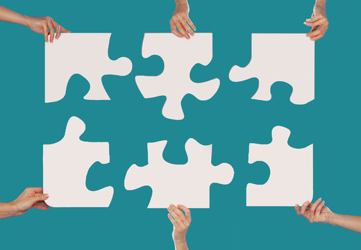Hands and puzzle