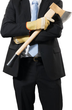 businessman carrying an axe to do the chopping