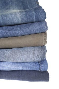 Stack of jeans isolated on the white