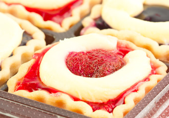 Close-up bakery cherry jam cake cup