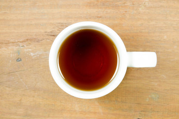 tea cup on wood background