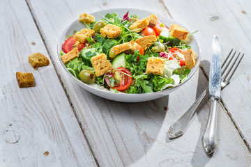 Salad with arugula and tomatoes ready to eat