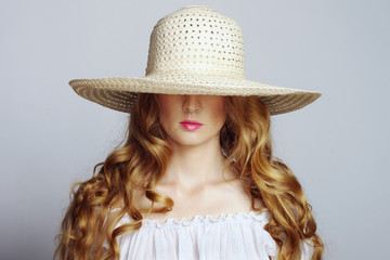 beautiful female model in a hat