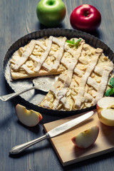Cutting fruits and baked apple pie
