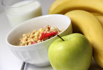 Healthy breakfast: muesli and fruits