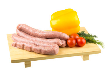 raw sausages and ingredients