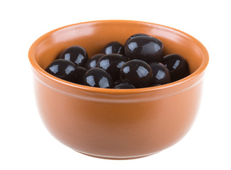 Olives black watered with olive oil in a bowl isolated on a whit