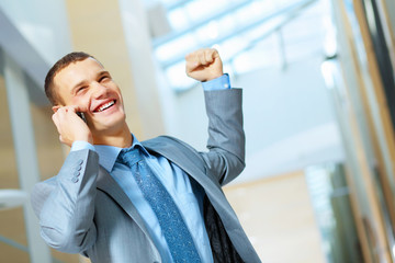 portrait of happy smiling young businesman