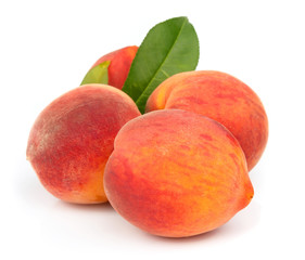fresh peaches with leaves