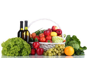 Composition with vegetables and fruits in wicker basket