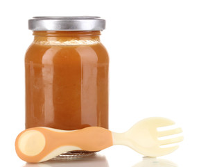 Useful and tasty baby food with beige small fork isolated