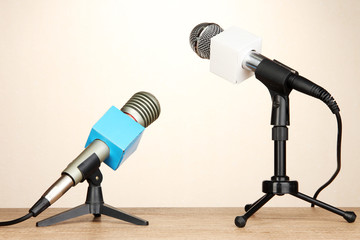 Microphone stands on meeting room table