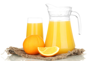 Full glass and jug of orange juice and oranges isolated on