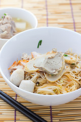 Noodles and meatball with chopsticks , asian noodle