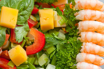 Boiled shrimp salad with cheese and vegetables.