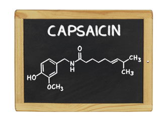 chemische Strukturformel von Capsaicin auf einer Schiefertafel