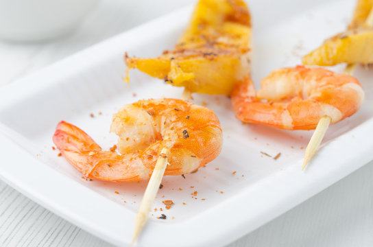 grilled shrimp and mango in the glaze closeup