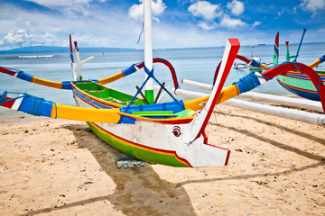 Traditional fishing boats on a beach, Nusa Dua, Bali.