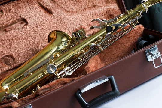 Vintage saxophone in brown case