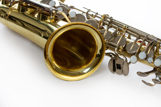Saxophone detail isolated on white