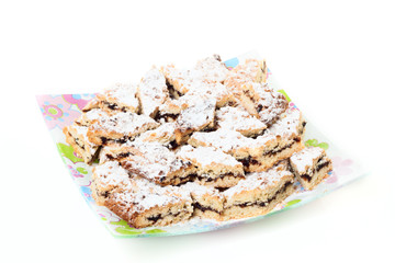 Sweet cookies on square plate