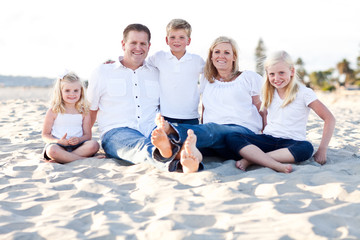 Happy Caucasian Family Portrait at the Beach