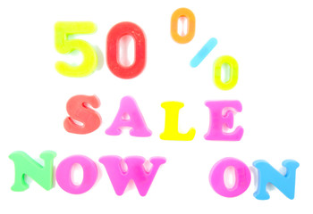 50% sale now on written in fridge magnets